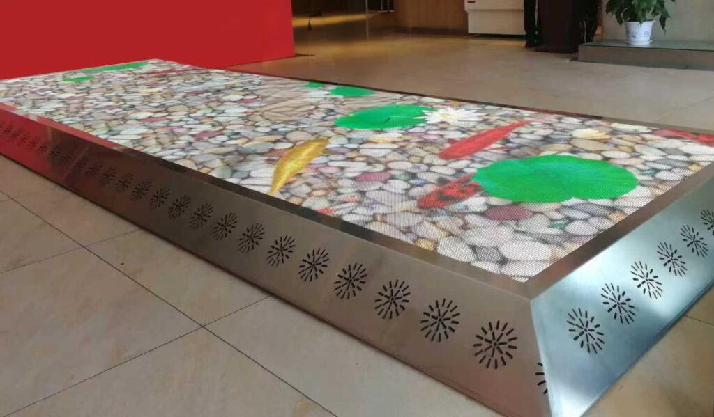 Cooling system with fans and ventilation for indoor LED floor display to prevent overheating, condensation and extend lifespan of interactive LED floor panels.