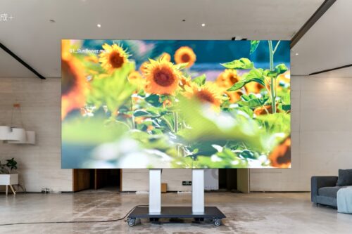 163-inch liftable and foldable Micro LED video wall displayed at Ocolour showroom in Shenzhen, ideal for home theater and high-end commercial spaces, supporting 108–217 inch pre-installed models and modular expansion.